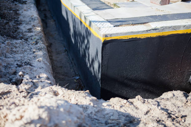 Professional Basement Waterproofing technician working in Middleport, OH